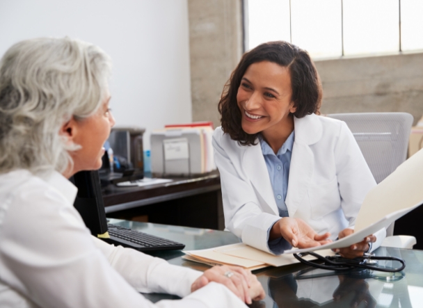 doctor chatting with a patient about treatment options