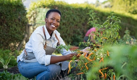 mature woman gardening outside