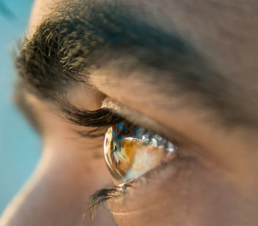 Side view of male eye close-up
