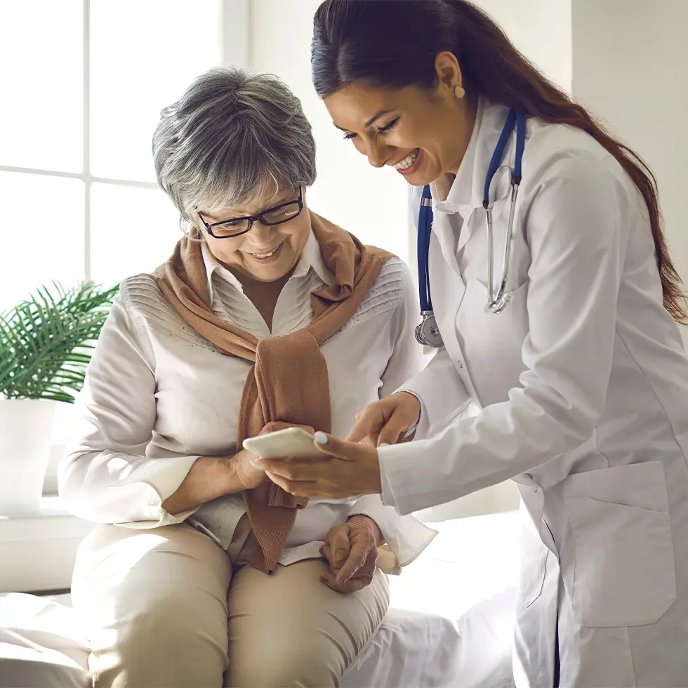 lady sitting in hospital exam room