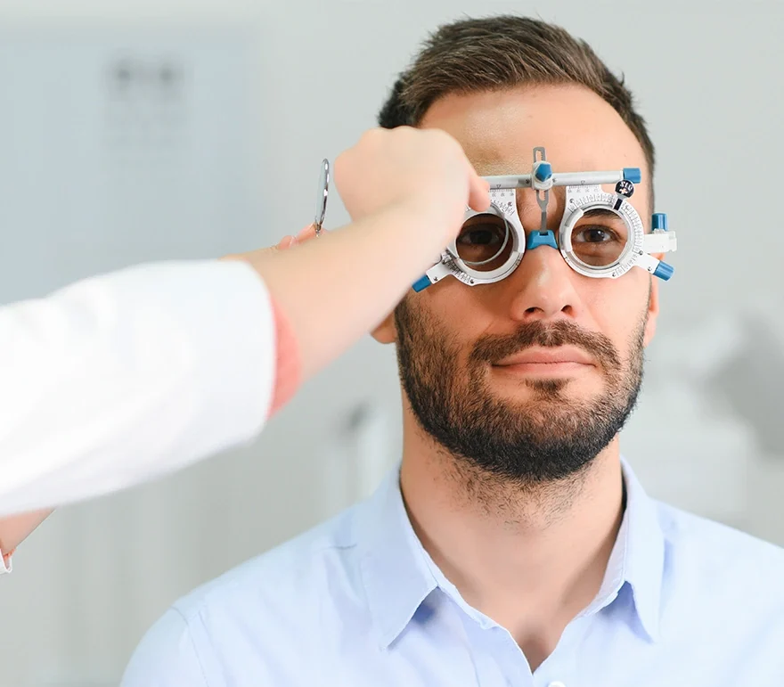 Opthalmologist checking patient for refractive errors