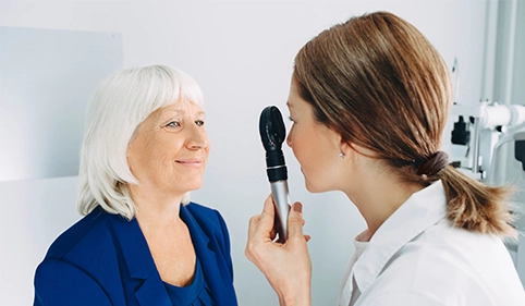 Senior woman having an eye consult
