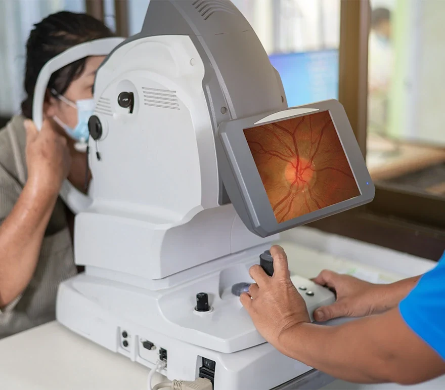 eye doctor taking pictures of the retina