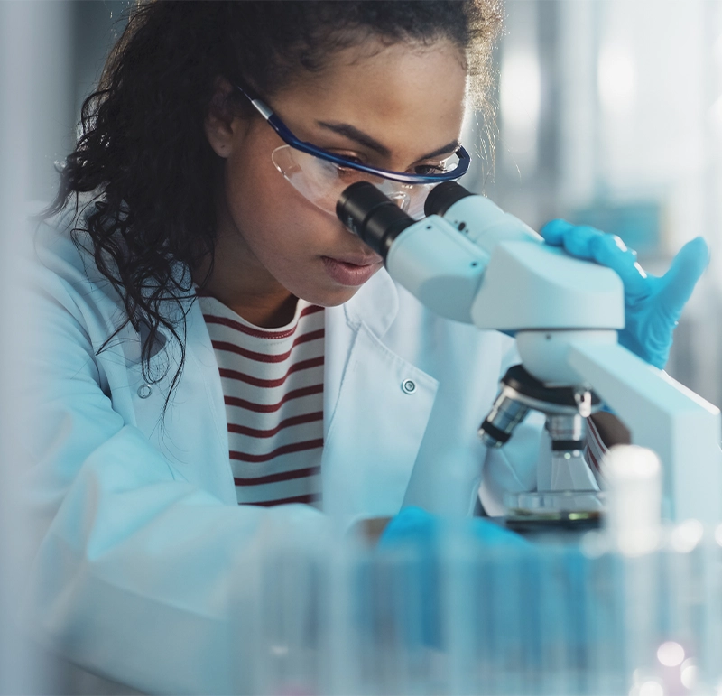 Woman specialist working with advanced equipment