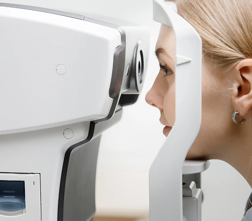 young woman is having an optical coherence tomography scan