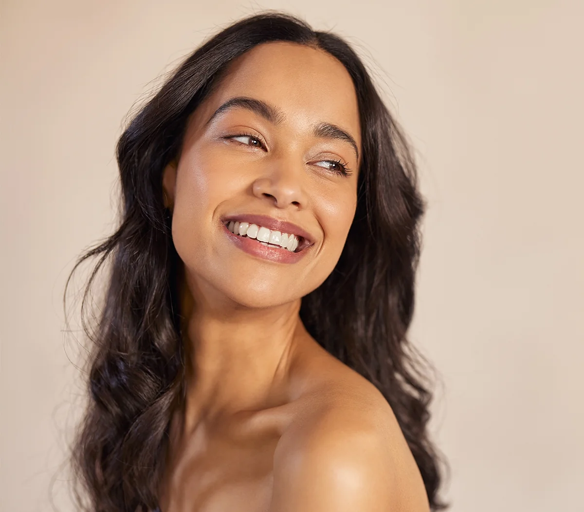 beautiful mature woman with smooth, clear skin after dermaplaning