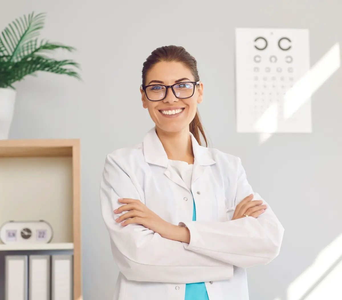 female optician in white medical uniform