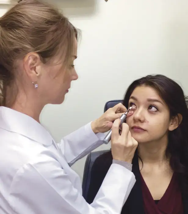 Female Patient receiving a Blephex treatment from doctor